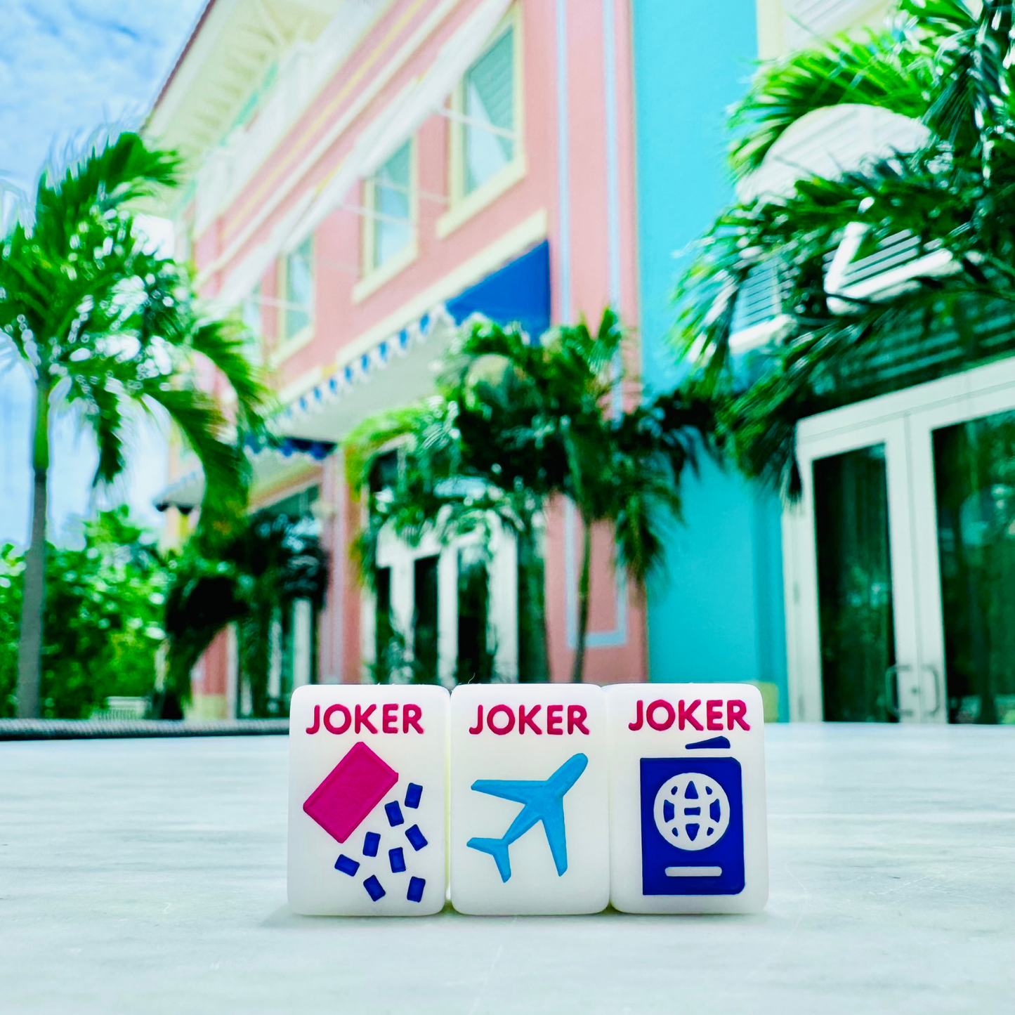 Mini Mahjong Travel tiles- three jokers on a tropical resort table