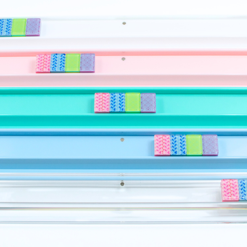 Mahjong Racks in Bright Colors of Premium Acrylic with colorful mahjongg tiles shown